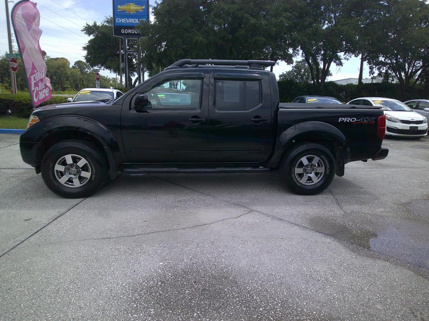 2012 BLACK NISSAN FRONTIER S; SL; PRO- (1N6AD0EV8CC) , located at 390 Hansen Avenue, Orange Park, FL, 32065, (904) 276-7933, 30.130497, -81.787529 - Photo#4